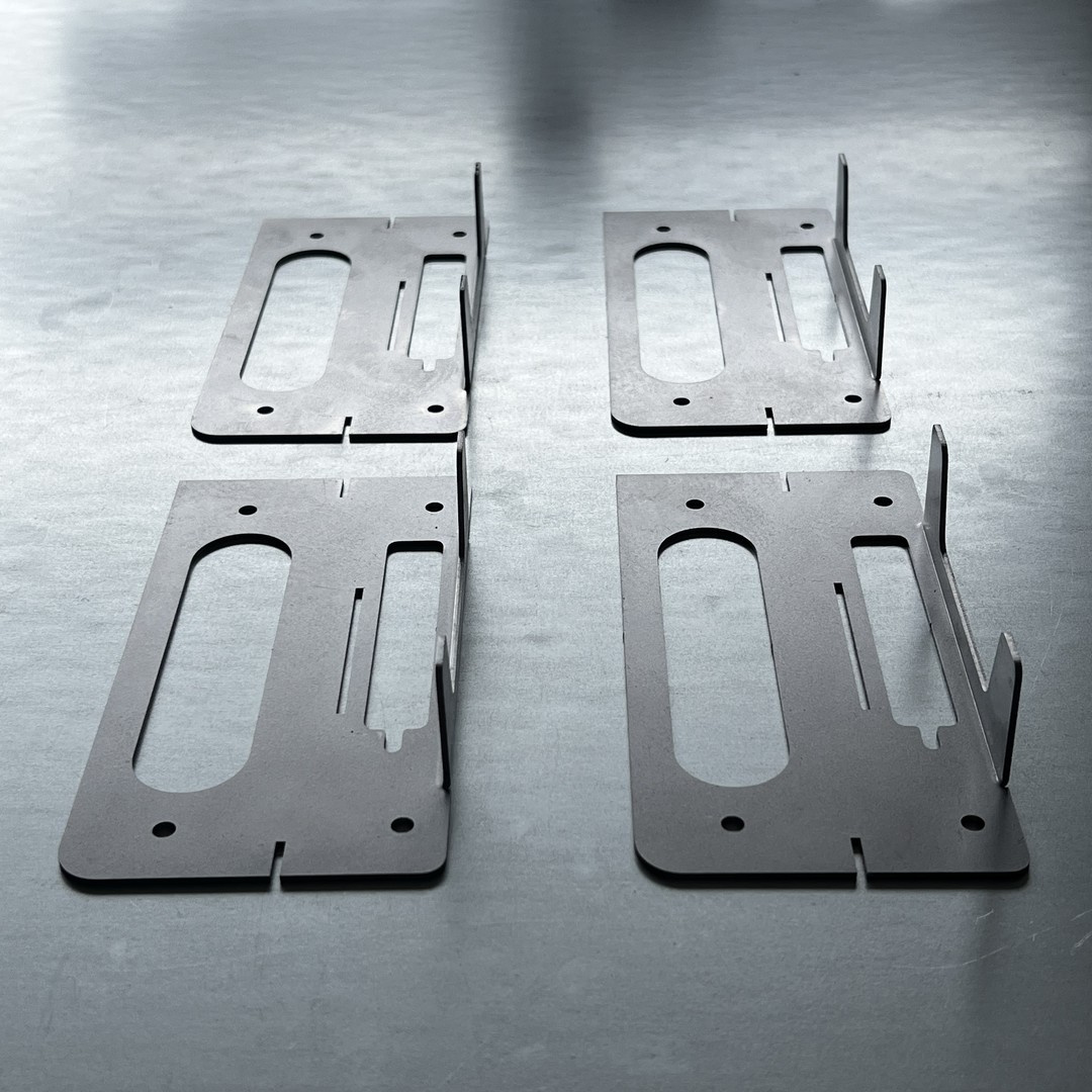 Piezas de corte por láser de piezas de metal personalizadas de fábrica con un solo lado
