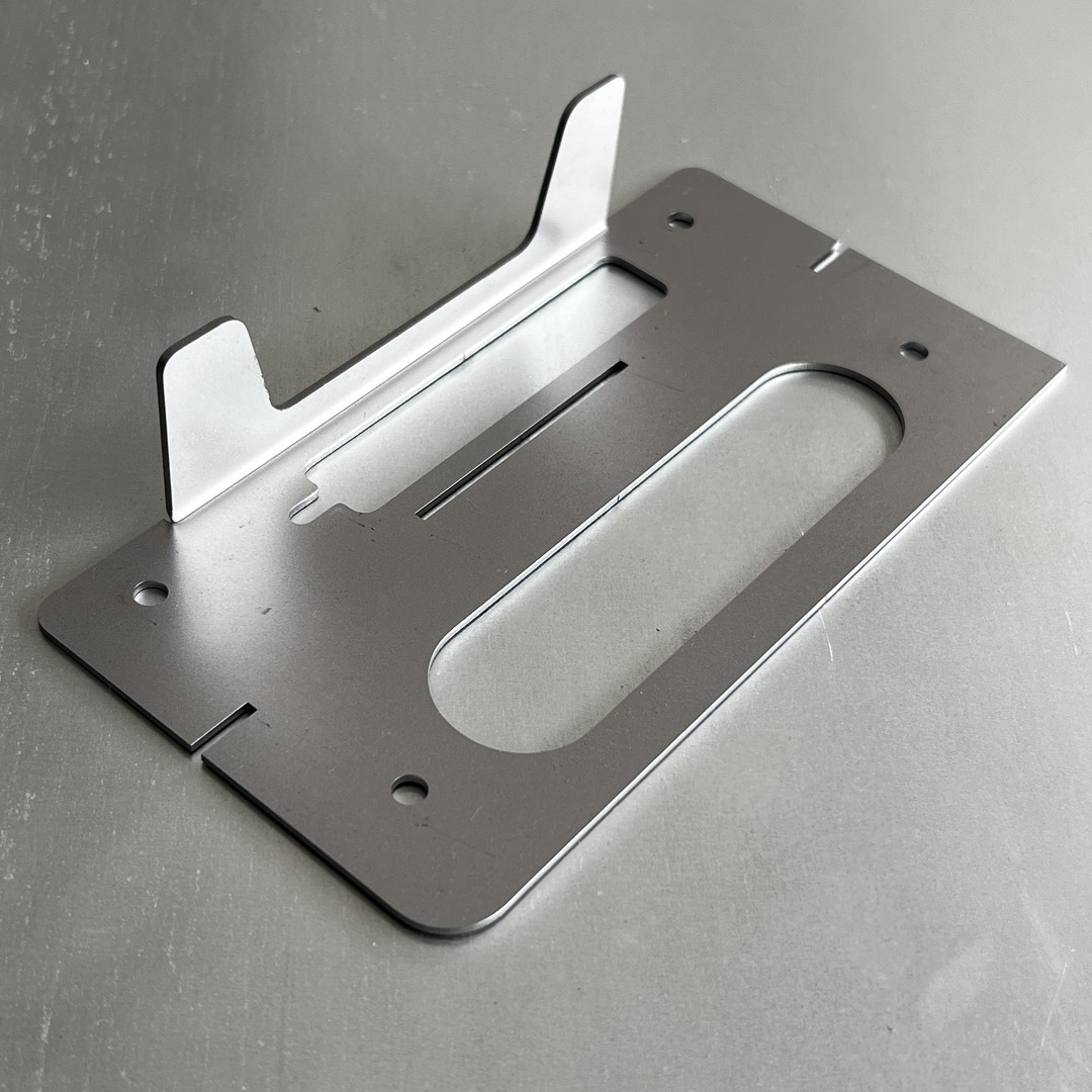 Piezas de corte por láser de piezas de metal personalizadas de fábrica con un solo lado