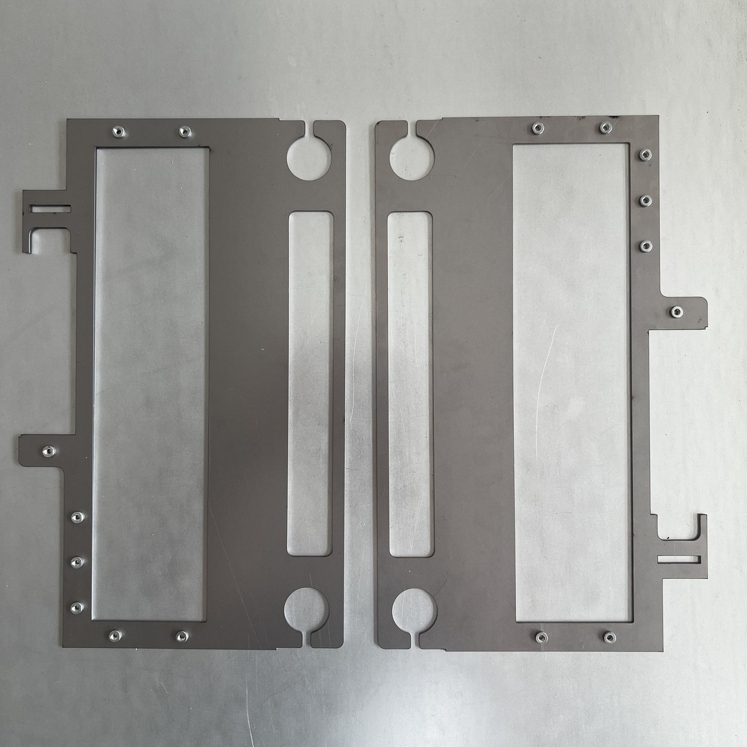 Estampado CNC personalizado de piezas de metal para la fabricación de chapa